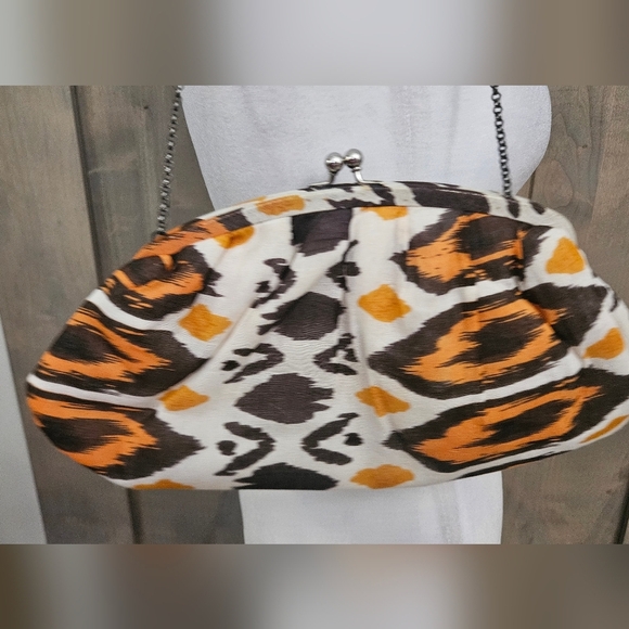 K.C.MALHAN Ikat Printed Woven Cloth Dumpling Chain Bag In Orange/brown Multi. - Picture 5 of 11